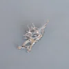 ABSTRACT METAL CLAW