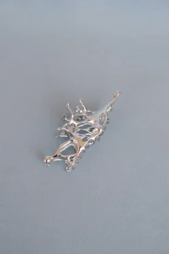 ABSTRACT METAL CLAW