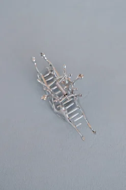 ABSTRACT METAL CLAW