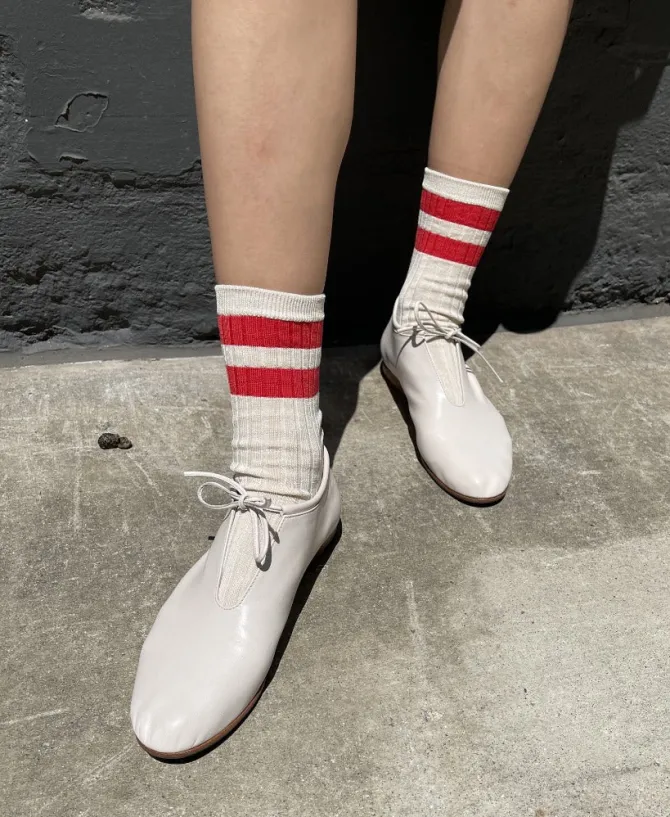 HER VARSITY SOCKS