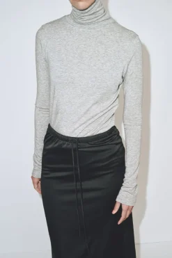 THIN RIBBED ROLL NECK TOP