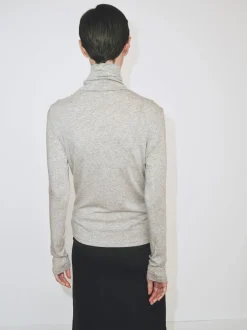 THIN RIBBED ROLL NECK TOP
