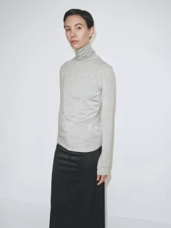 THIN RIBBED ROLL NECK TOP