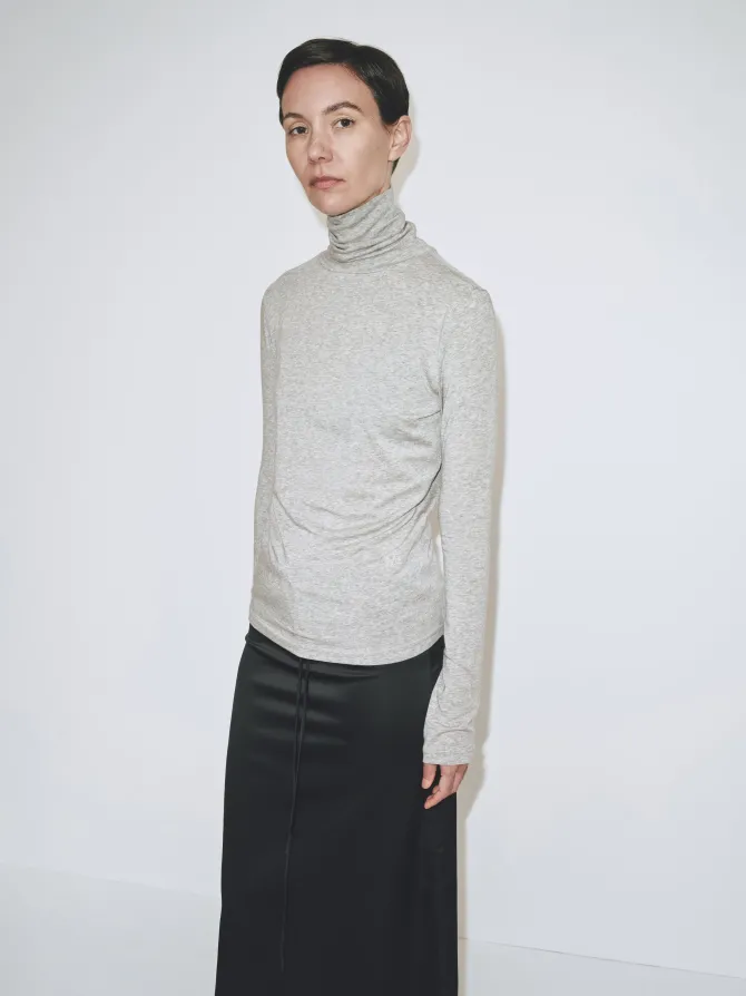 THIN RIBBED ROLL NECK TOP