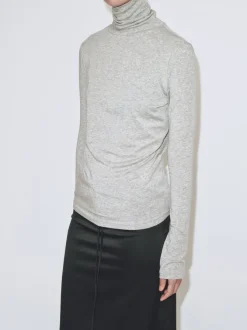 THIN RIBBED ROLL NECK TOP