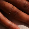 TWISTED THIN STACKING RING