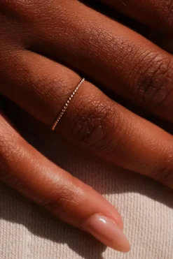 TWISTED THIN STACKING RING