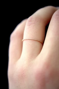 TWISTED THIN STACKING RING
