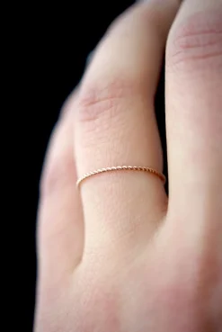 TWISTED THIN STACKING RING