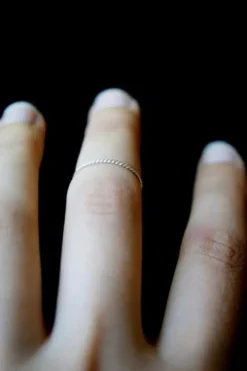 TWISTED THIN STACKING RING